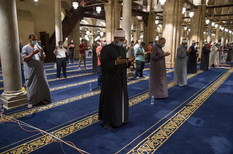 epa08432659 Muslims in Egypt performing Laylat al-Qadr (Arabic for Night of Destiny) prayer inside Al Azhar mosque in Egypt, Cairo, 19 May 2020. Laylat al-Qadr (Arabic for Night of Destiny) is believed to be the night when the first verse of Islam's holy book, the Koran, was revealed to Prophet Muhammad, the exact date is not known but it is believed to be on an odd night of the last 10 nights of the holy month of Ramadan.  EPA/Mohamed Hossam