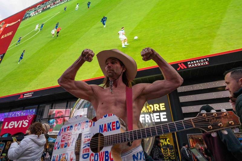 The naked cowboy made the World Cup rounds in New York's Time Square. Getty / AFP