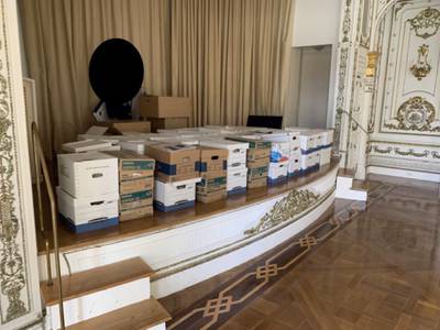 Records being stored on the stage in the White and Gold Ballroom at Mar-a-Lago. AP