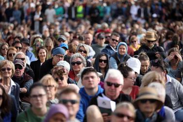 People attend the national remembrance service for the 50 victims of the Christchurch mosque shootings, held at Hagley Park on March 29, 2019. AFP