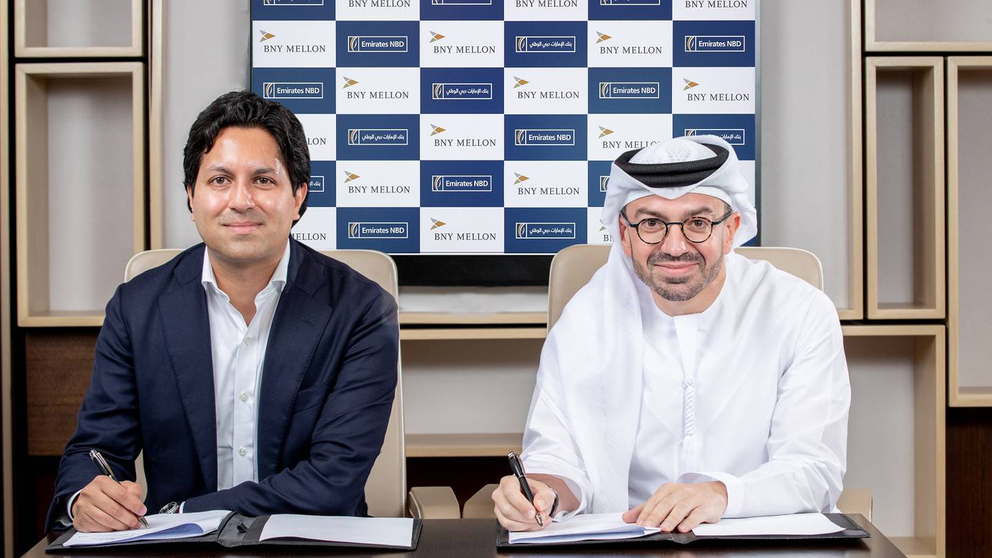 توقيع اتفاقية بين بنك نيويورك ميلون وبنك الإمارات دبي الوطني لتوسيع وصول المستثمرين الأجانب إلى أسواق الإمارات العربية المتحدة