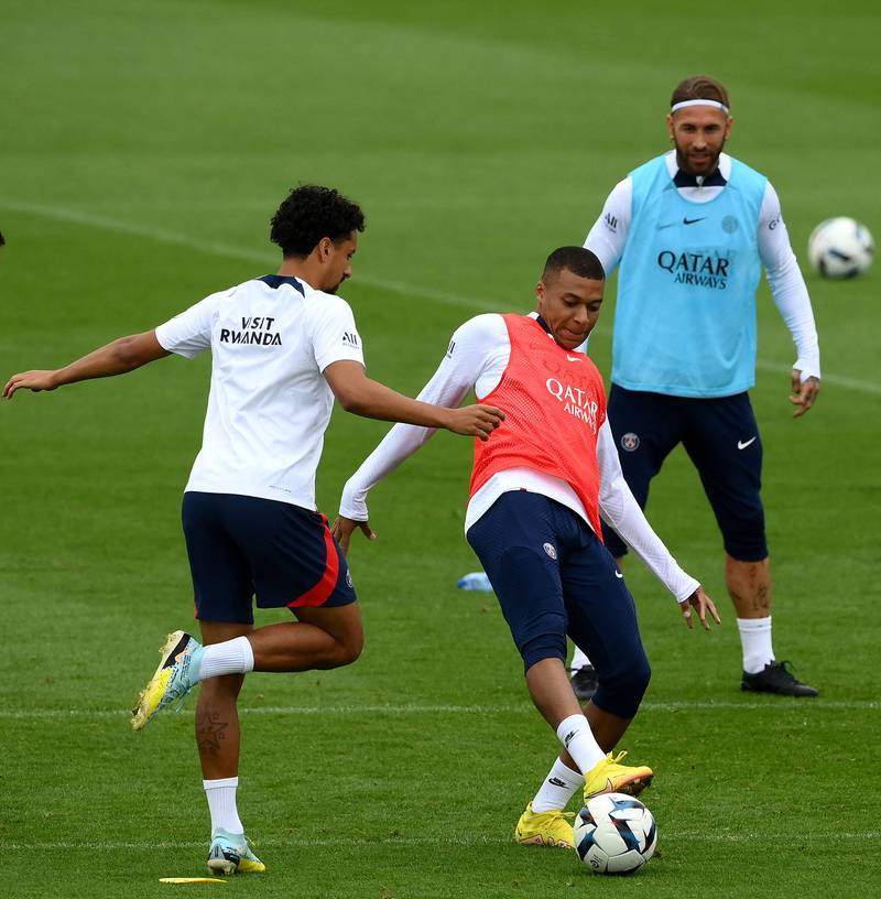 Marquinhos fights for the ball with Kylian Mbappe during training in Paris. AFP