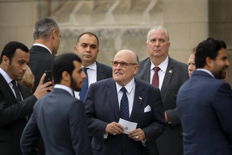 Rudy Giuliani (C) arrives at the Washington National Cathedral for the funeral service for John McCain. Getty Images/ AFP