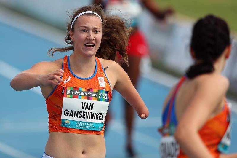 Marlene van Gansewinkel (L) and Kimberly Alkemade (R) of Netherlands react after the Women's 200m T64 final at the World Para Athletics Championships in Dubai, United Arab Emirates.  EPA
