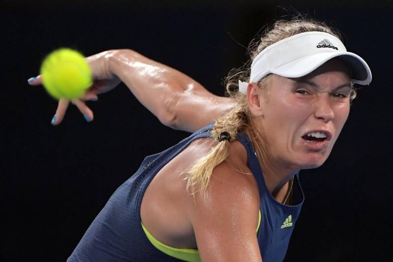 Caroline Wozniacki of Denmark in action during her women's singles final match against Simona Halep of Romania at the Australian Open tennis tournament in Melbourne. Lukas Coch / EPA