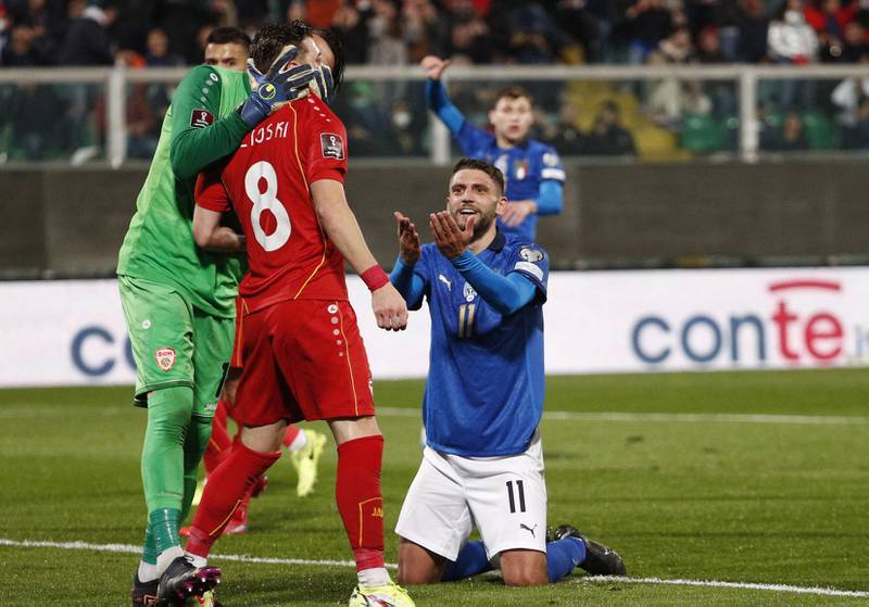 Italy's Domenico Berardi argues with an opponent. Reuters