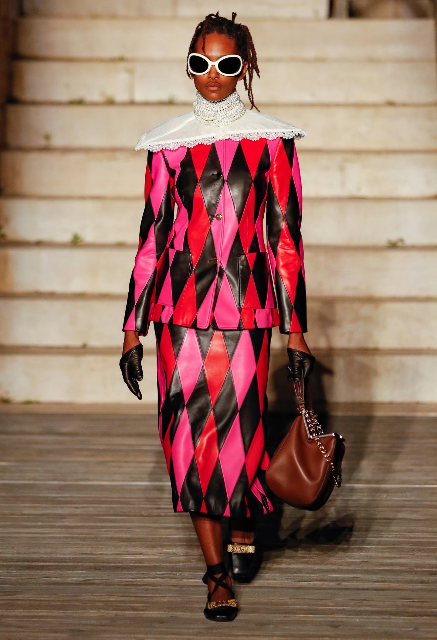 Gucci resort 2023 featured holographic, chevroned looks. Photo: Gucci