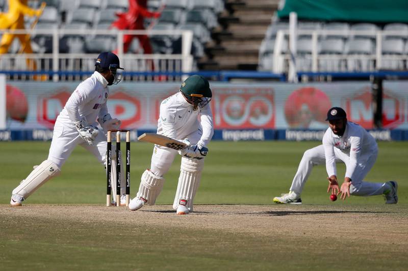 South Africa batsman Rassie van der Dussen watches the ball fall short of an India fielder. AFP