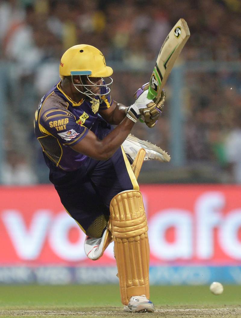 Kolkata Knight Riders Andre Russell plays a shot during the 2016 Indian Premier League (IPL) Twenty20 cricket match between Kolkata Knight Riders and Royal Challengers Bangalore at the Eden Gardens Cricket Stadium in Kolkata on May 16, 2016.  ----IMAGE RESTRICTED TO EDITORIAL USE - STRICTLY NO COMMERCIAL USE----- / GETTYOUT' / AFP PHOTO / Dibyangshu SARKAR