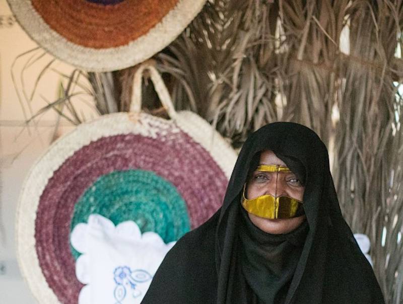 A burqa is made of a cloth called al sheel and then a wooden piece known as al seif is placed in the centre of the fabric, where the nose is. Photo: Abu Dhabi Department of Culture and Tourism