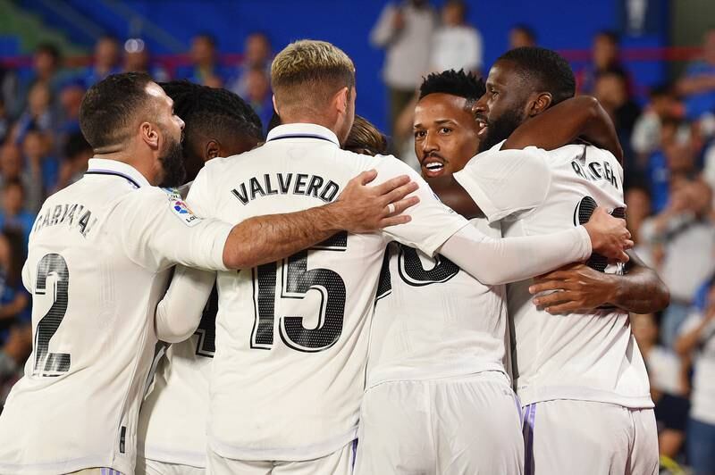 Eder Militao celebrates with teammates after scoring Real Madrid's first goal against Getafe. Getty