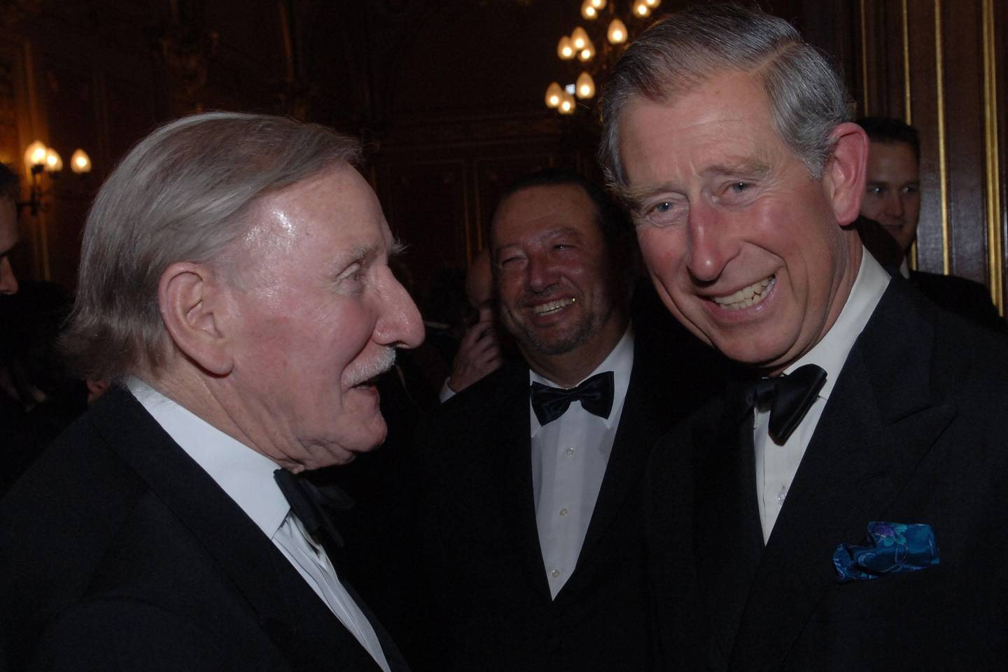 Leslie Philips with then Prince Charles at the Royal Shakespeare Company's gala fundraising dinner in 2006. AP