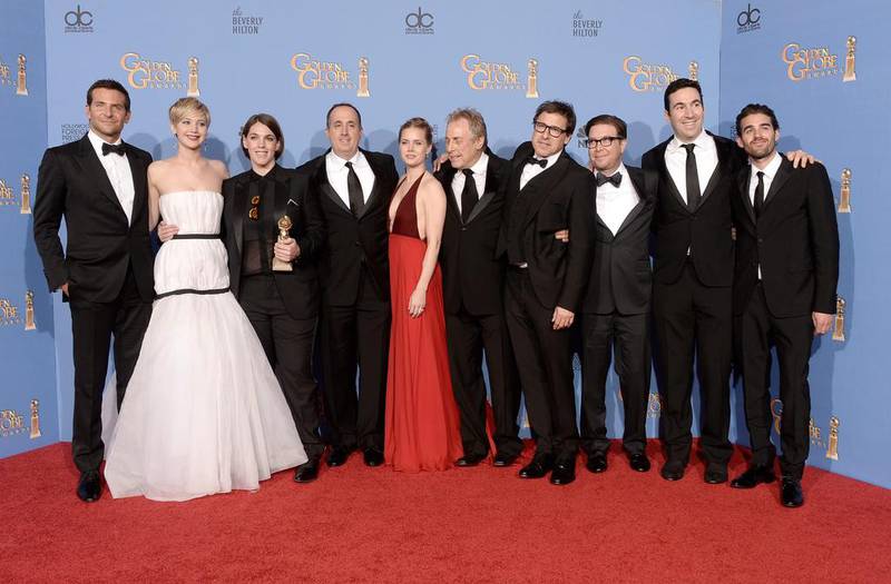 Cast and producers of American Hustle, winners of Best Motion Picture - Musical or Comedy for American Hustle, pose in the press room during the 71st Annual Golden Globe Awards held at The Beverly Hilton Hotel.  Getty Images / AFP 