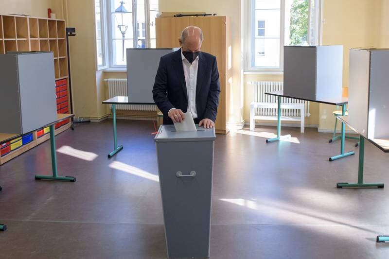 Olaf Scholz, chancellor candidate of the German Social Democrats, votes in the federal parliamentary elections at a polling station in Potsdam. Getty Images