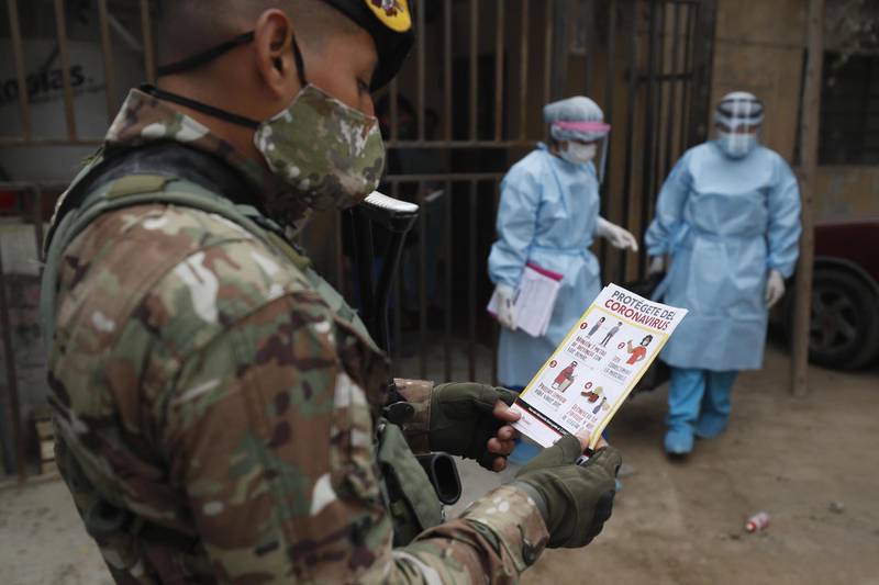 Medical personnel, supported by the army, carry out Covid-19 tests on the inhabitants of the Pampa Los Olivares-Villa Leticia de Cajamarquilla Human Settlement, in Lima, Peru. EPA