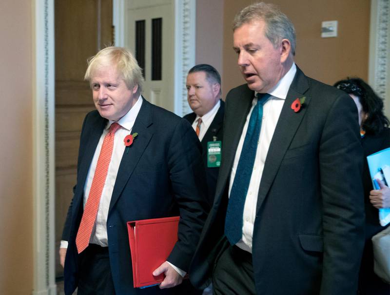 epa07704643 (FILE) - British Foreign Secretary Boris Johnson  (L) walks with British Ambassador to the United States Sir Kim Darroch (R) following a meeting on Capitol Hill in Washington, DC, USA, 08 November 2017 (reissued 09 July 2019). According to media reports, US president Donald Trump has said they he will no longer work with British Ambassador to the United States Sir Kim Darroch after emails were leaked from Darroch, calling Trump's administration inept.  EPA/MICHAEL REYNOLDS