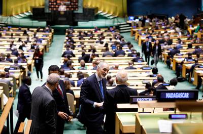 Bashar al-Ja'afari, second right, Syria's Ambassador to the United Nations, talks with Ibrahim al-Eshaiker al-Jaafari, right, Iraq's Foreign Minister, on the sidelines of the Nelson Mandela Peace Summit during the 73rd session of the General Assembly of the United Nations at United Nations Headquarters in New York. EPA