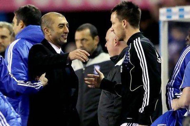 Chelsea's interim manager, Roberto Di Matteo, expects John Terry, right, to be fit for tomorrow's visit of Stoke City. Scott Heavey / Getty Images