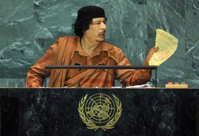 epa02610438 (FILE) A file photo dated 23 September 2009 shows Libyan leader Muammar Gaddafi as he speaks to the United Nations General Assembly in New York, USA. Born in 1942 in Sirte, then Italian Libya, into a Bedouin family, Gaddafi went to a military academy and joined an anti-monarchy conspiracy, which brought him into power by coup d'etat against King Idris on 01 September 1969. His 41-year rule as 'Leader of the Revolution' may now come to a violent end as uprisings have spread to Libya from neighbouring Tunisia and Egypt. While protesters are taking control of Libyan cities and the UN and many Western states imposed sanctions, 68-year-old Gaddafi is still fighting to maintain his grip on the country.  EPA/JASON SZENES *** Local Caption ***  02610438.jpg