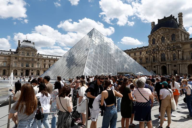 Tourists at the Louvre Museum in Paris. Europe is leading the rebound in international tourism, welcoming 68 per cent of the world's 700 million tourists in the January-September period. Reuters