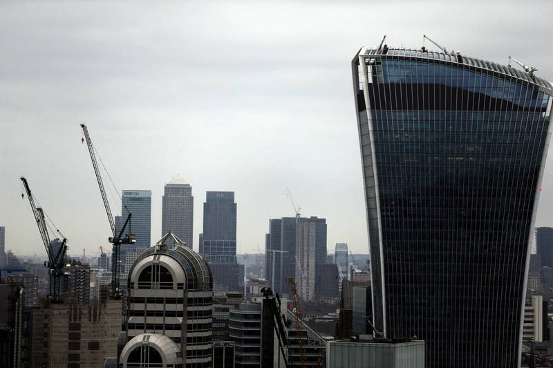The Canary Wharf financial district of London. The UK's borrowing figures in December were boosted by more housing stamp duty and fuel taxes. Reuters