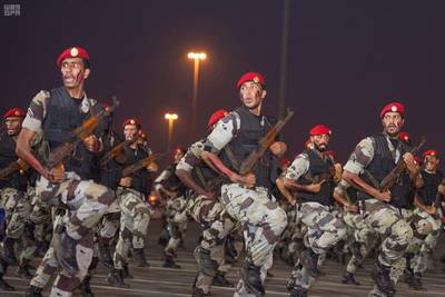 Members of Saudi security forces march during a military parade in preparation for the annual Haj pilgrimage in the holy city of Mecca, Saudi Arabia, August 23, 2017. Saudi Press Agency/Handout via REUTERS ATTENTION EDITORS - THIS PICTURE WAS PROVIDED BY A THIRD PARTY. NO RESALES. NO ARCHIVE.