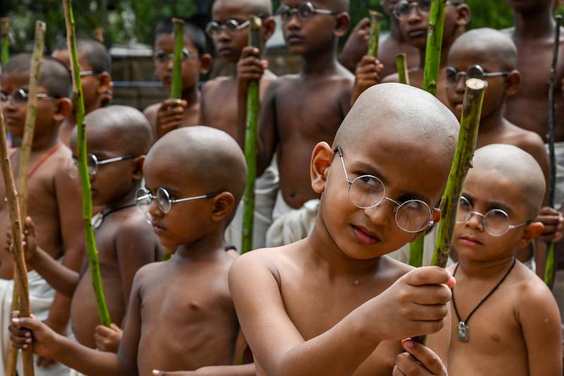 Children dressed as Mahatma Gandhi on the eve of his birth anniversary, in Chennai, India, on October 1. AFP