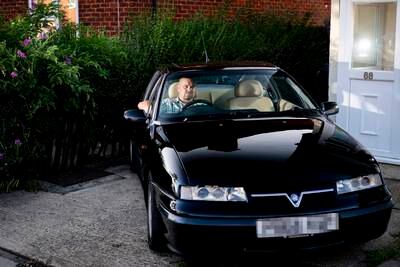 Richard Moore, 53, a motorway communication engineer from Hainault, East London, with his limited edition 1996 Vauxhall Calibra Turbo 4x4, says the expansion is 'the final nail in the coffin and I am looking to relocate my family and I to outside the new boundary'