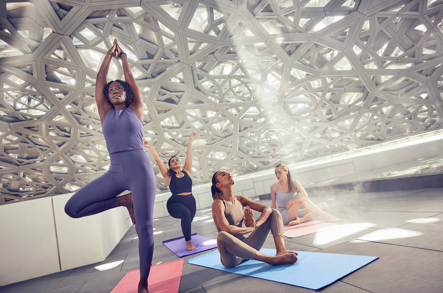 Try yoga under the famous Louvre Abu Dhabi dome. Photo: DCT - Abu Dhabi