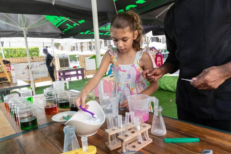 Older children will enjoy the mini science lab set-up outdoors