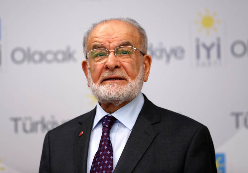 Temel Karamollaoglu, the leader of Islamist Saadet Party, is seen during a news conference with Iyi Party leader Meral Aksener (not pictured) in Ankara, Turkey April 24, 2018. Picture taken April 24, 2018. REUTERS/Murad Sezer - RC12A72C67C0