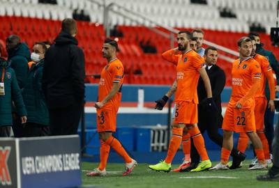 Players of Basaksehir leave the pitch during the Uefa Champions League Group H match against Paris Saint-Germain. EPA
