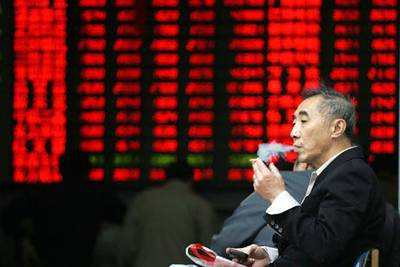 Shares traded in the Shanghai stock exchange, designated for purchase by local Chinese only, have declined in the past two years. AP Photo