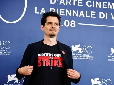 Protest T-shirts and gorgeous gowns at the opening of Venice Film Festival 2023