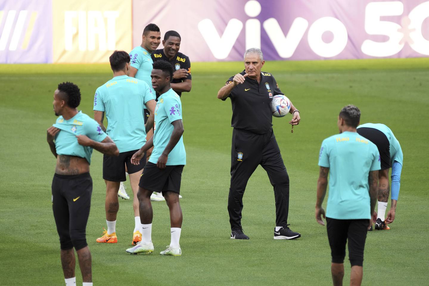 Brazil head coach Tite, centre, instructs his players during a training session in Tokyo in June, 2022. AP 