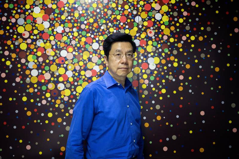 Kai-Fu Lee, founder of Sinovation Ventures, poses for a photograph in Beijing, China, on Tuesday, Aug. 15, 2017. Sinovation Ventures' latest growing endeavor, an in-house AI Institute, has about 30 full-time employees with plans to grow headcount to about a hundred within the year. Photographer: Giulia Marchi/Bloomberg