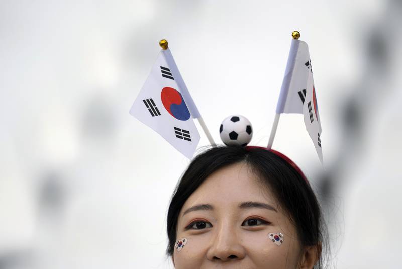 A South Korea fan waits for the start of the Group H match against Uruguay. AP Photo