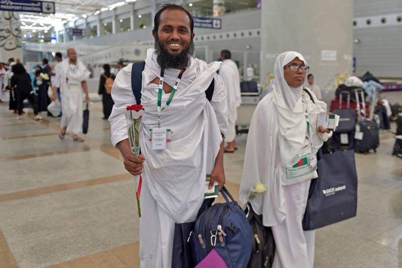 Muslim pilgrims arrive at King Abdulaziz International Airport in Jeddah. Saudi Arabia has welcomed its first batch of Hajj pilgrims from abroad since the start of the coronavirus pandemic, which prompted the authorities to impose restrictions. AFP