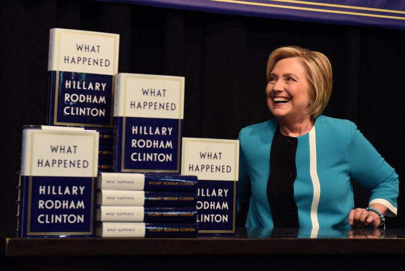 (FILES) In this file photo taken on September 12, 2017 Hillary Clinton kicks off her book tour of her memoire of the 2016 presidential campaign titled "What Happened" with a signing at the Barnes & Noble in Union Square in New York. Hillary Clinton, the former secretary of state who ran against Donald Trump for president in 2016, is to publish a suspense thriller with Canadian author Louise Penny in October, publishers Simon & Schuster and St. Martin's Press said on February 23, 2021. / AFP / TIMOTHY A. CLARY
