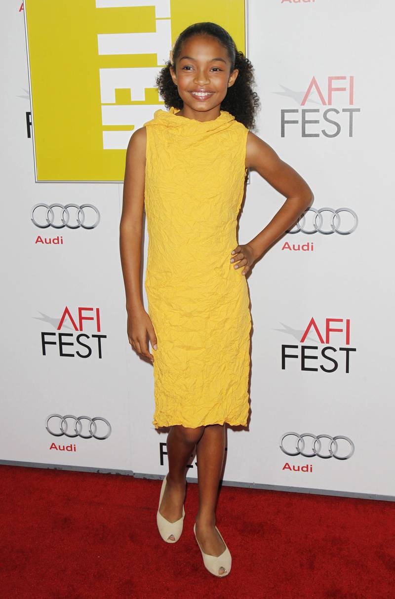 Yara Shahidi wears a yellow midi-dress for a screening of 'Butter' on November 6, 2011. Reuters