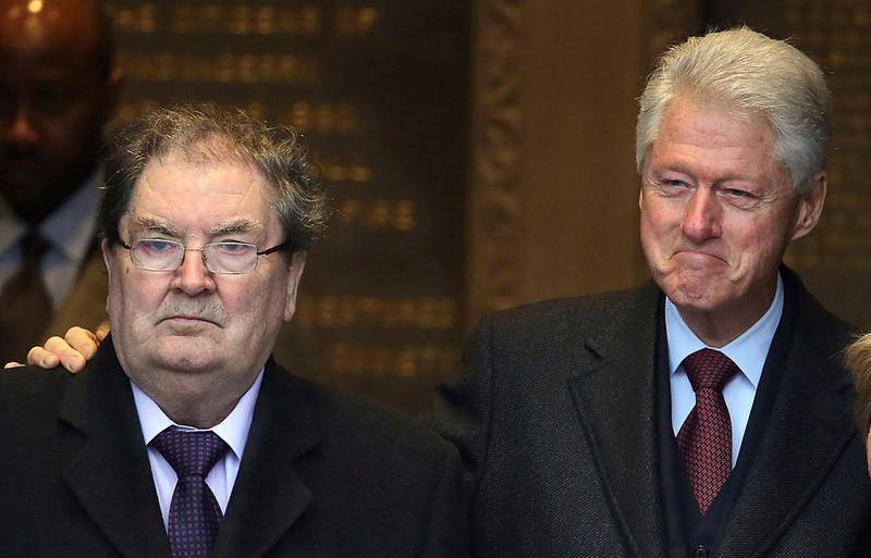 Bill Clinton poses with John Hume at the Guildhall in Derry on the same day. AP Photo