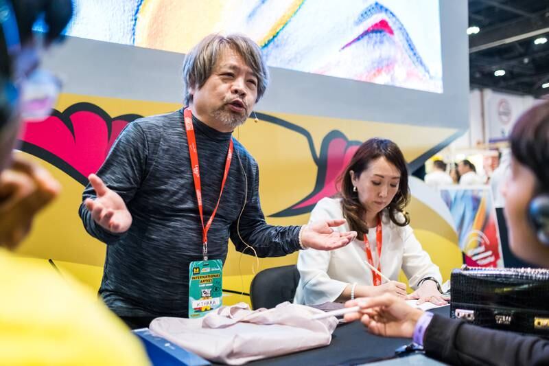 Writer and animator Hirokatsu Kihara addressing the audience at Middle East Film and Comic Con. Photo: MEFCC