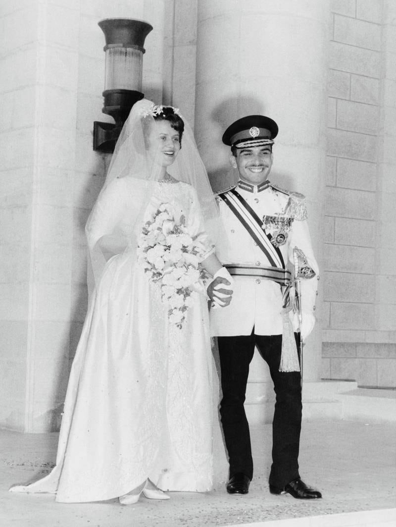 King Hussein (1935 - 1999) and Antoinette Gardiner (Princess Muna al-Hussein) leaving the Zahran Palace after their wedding ceremony, Amman, Jordan, 29th May 1961. (Photo by Central Press/Hulton Archive/Getty Images) 