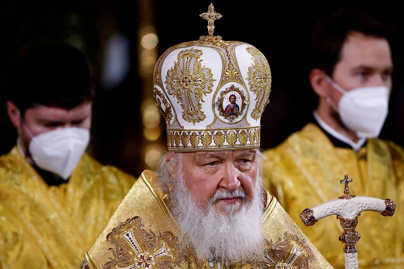 Patriarch Kirill of Moscow and All Russia conducts the Orthodox Christmas service at the Cathedral of Christ the Saviour in Moscow, in January. A feud has broken out between the churches in Russia and Ukraine. Reuters