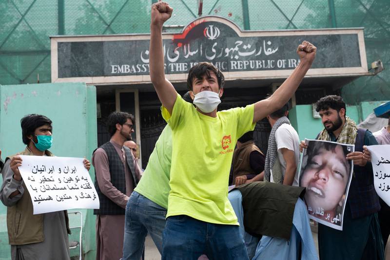 Demonstrators gather in front of the Iranian embassy in Kabul after a video purporting to show Afghan refugees being beaten by Iranians was released online. AFP