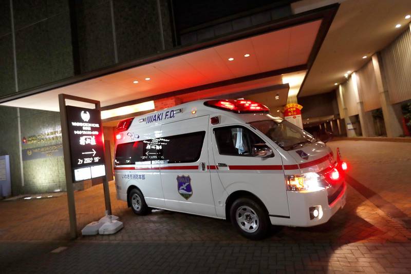 An ambulance is seen in front of a hotel following a strong earthquake in Iwaki, Fukushima prefecture, Japan February 13, 2021. REUTERS
