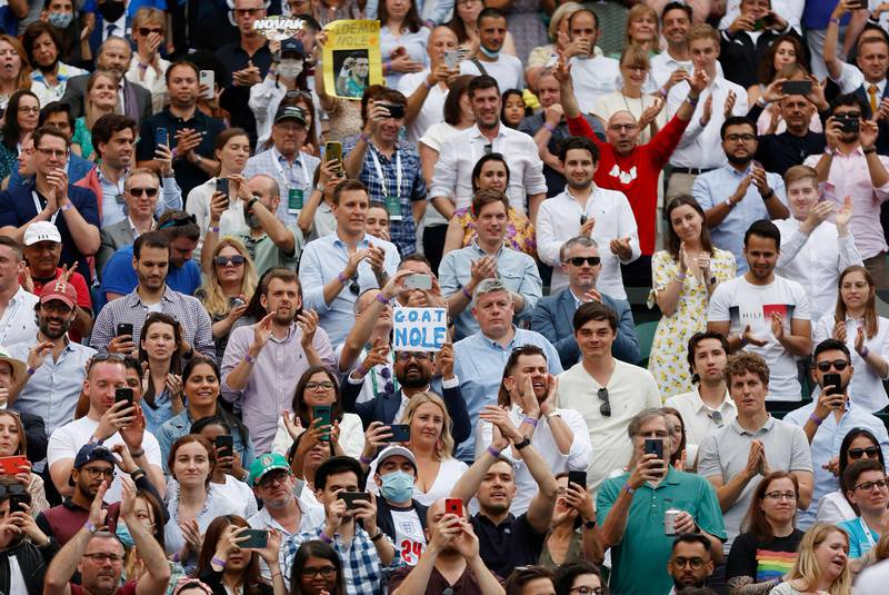 Spectators cheer after Serbia's Novak Djokovic defeated Canada's Denis Shapovalov.