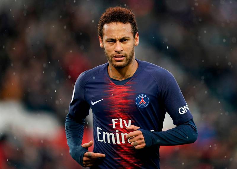 (FILES) In this file photo taken on May 4, 2019 Paris Saint-Germain's Brazilian forward Neymar looks on during the French L1 football match between Paris Saint-Germain (PSG) and OGC Nice at the Parc des Princes stadium in Paris. Neymar failed to show up for pre-season training with Paris Saint-Germain on July 8, 2019 with the club announcing they would take "appropriate action". Paris Saint-Germain president Nasser Al-Khelaifi has warned Neymar and his other highly-paid stars that they must shape-up or ship out, claiming "celebrity behaviour" at the French champions will not be tolerated. / AFP / Lionel BONAVENTURE
