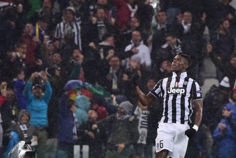 Juventus midfielder Paul Labile Pogba celebrates after scoring the winner in a 3-2 victory over Olympiakos in the Champions League on Tuesday in Turin. Giuseppe Cacae / AFP / November 4, 2014 