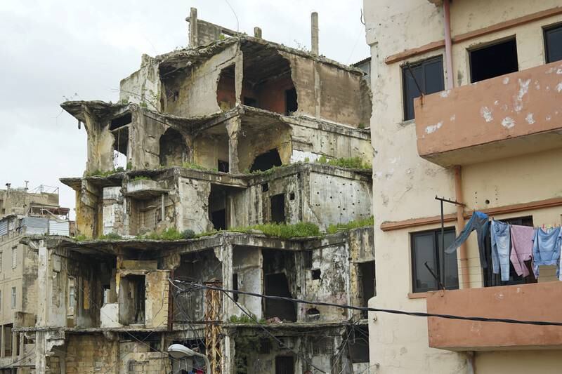 Many of the buildings around Bab al Tabbaneh and Jabal Mohsen in Tripoli, Lebanon, have been severely damaged by bouts of sectarian violence between the two neighbourhoods over the years. Olivia Cuthbert for The National